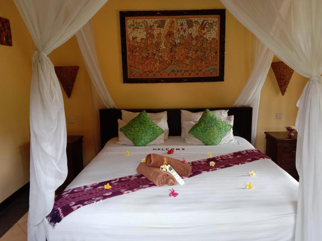 เตียร์ตา ซารี บังกาโล Hotel เปมูเตรัน ภายนอก รูปภาพ