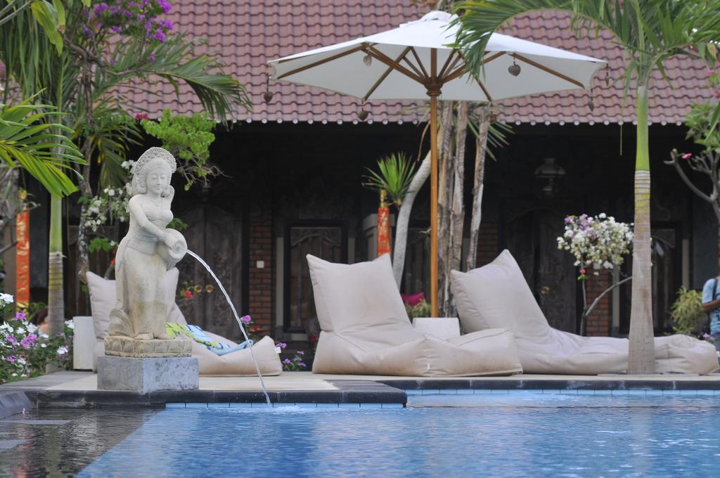เตียร์ตา ซารี บังกาโล Hotel เปมูเตรัน ภายนอก รูปภาพ