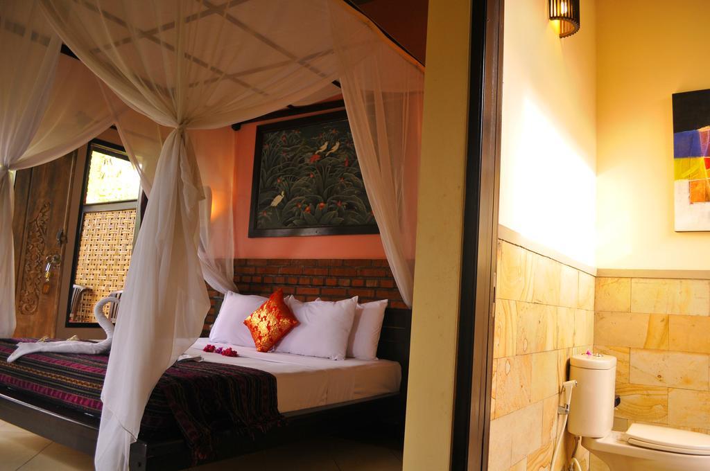 เตียร์ตา ซารี บังกาโล Hotel เปมูเตรัน ภายนอก รูปภาพ