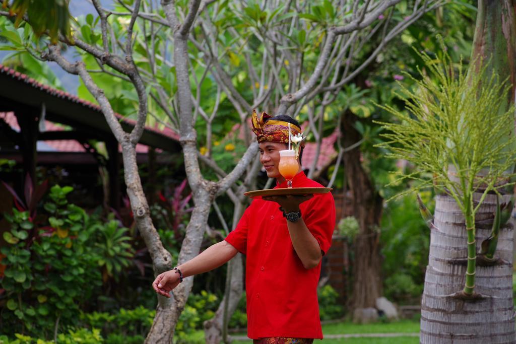 เตียร์ตา ซารี บังกาโล Hotel เปมูเตรัน ภายนอก รูปภาพ