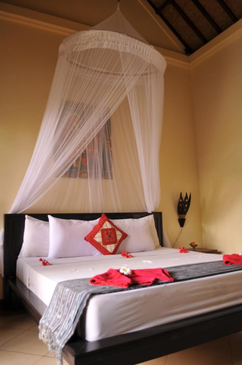 เตียร์ตา ซารี บังกาโล Hotel เปมูเตรัน ภายนอก รูปภาพ